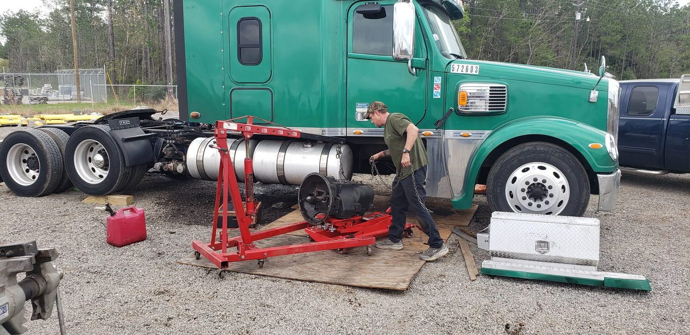 Twin Screw On-Site technician working on a diesel truck on-site